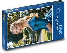 Kobieta w niebieskiej sukience Puzzle 260 elementów - 41x28,7 cm