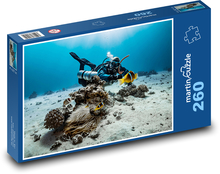 Nurek w morzu Puzzle 260 elementów - 41x28,7 cm