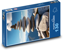 Steinpyramide am Strand Puzzle 130 Teile - 28,7x20 cm
