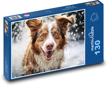 Ein fröhlicher Hund im Schnee Puzzle 130 Teile - 28,7x20 cm