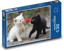 Białe i czarne kocięta Puzzle 130 elementów - 28,7x20 cm