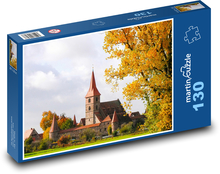 Kościół w jesiennym pejzażu Puzzle 130 elementów - 28,7x20 cm