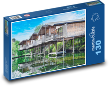 Rezydencje wodne - domy Puzzle 130 elementów - 28,7x20 cm